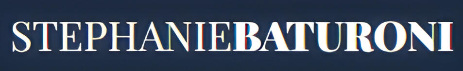 blond woman smiling with arms crossed